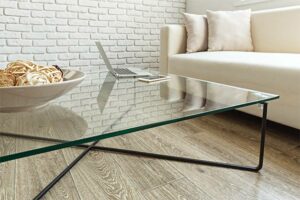 Modern glass table in the loft interior