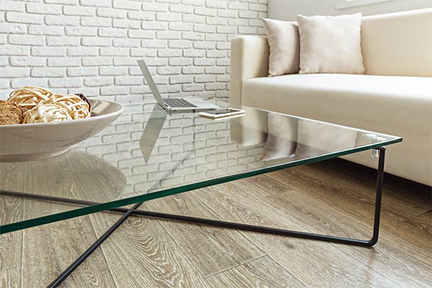 Modern glass table in the loft interior